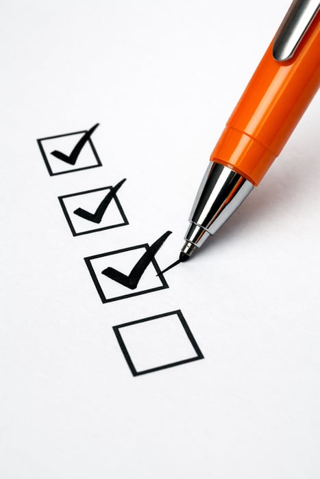 an orange pen filling checkboxes-3 an orange pen filling checkboxes-3